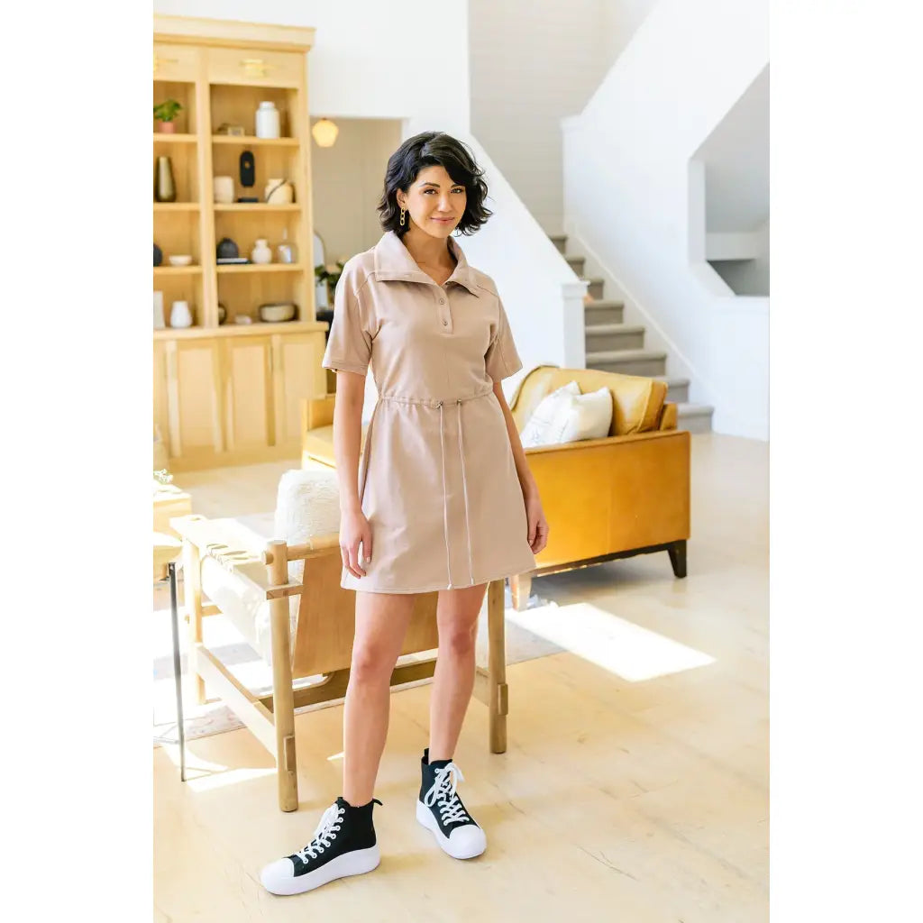 This French Terry collared mini dress brings comfort with sporty polish in a beautiful taupe. Flattering fit for all