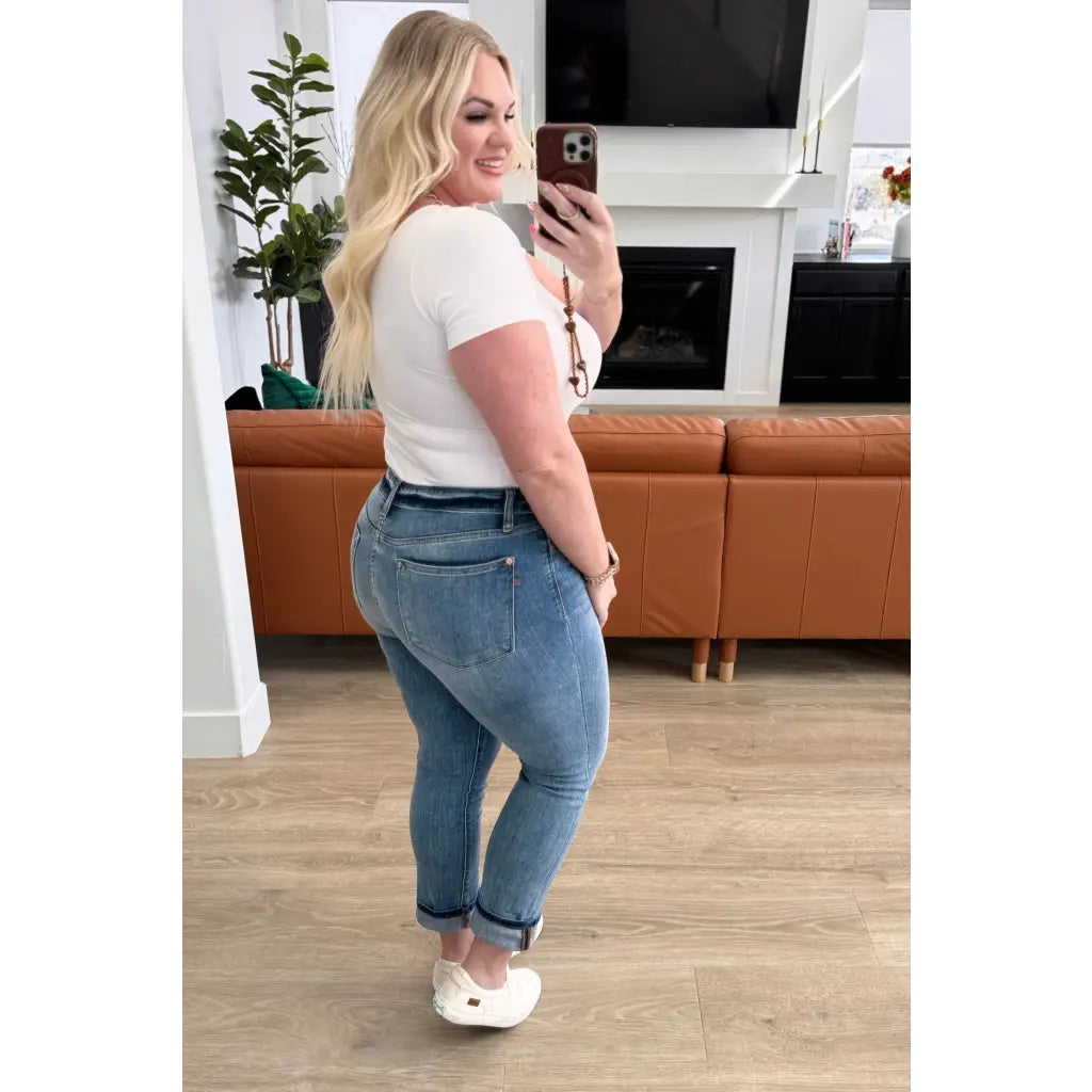 Introducing our Laura Mid Rise Cuffed Skinny Capri Jeans by Judy Blue your new go-to 4-way stretchy denim. The mid rise