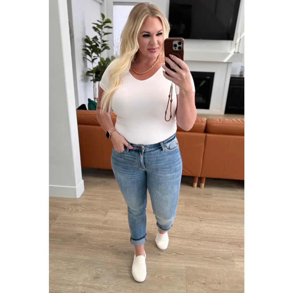 Introducing our Laura Mid Rise Cuffed Skinny Capri Jeans by Judy Blue your new go-to 4-way stretchy denim. The mid rise