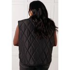 Our Layering Queen Puffer Vest is made from a black quilted windbreaker material. This vest will keep you warm