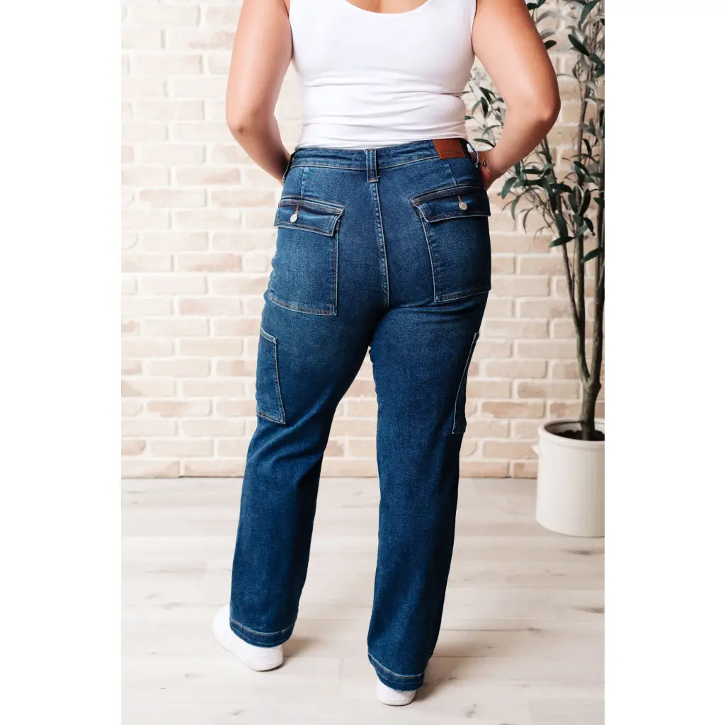 Our Leila Cargo Judy Blue Jeans feature a trendy high rise fit versatile straight cut and cargo pockets. The 4-way