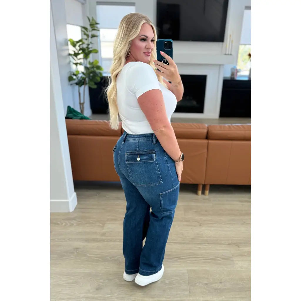 Our Leila Cargo Judy Blue Jeans feature a trendy high rise fit versatile straight cut and cargo pockets. The 4-way