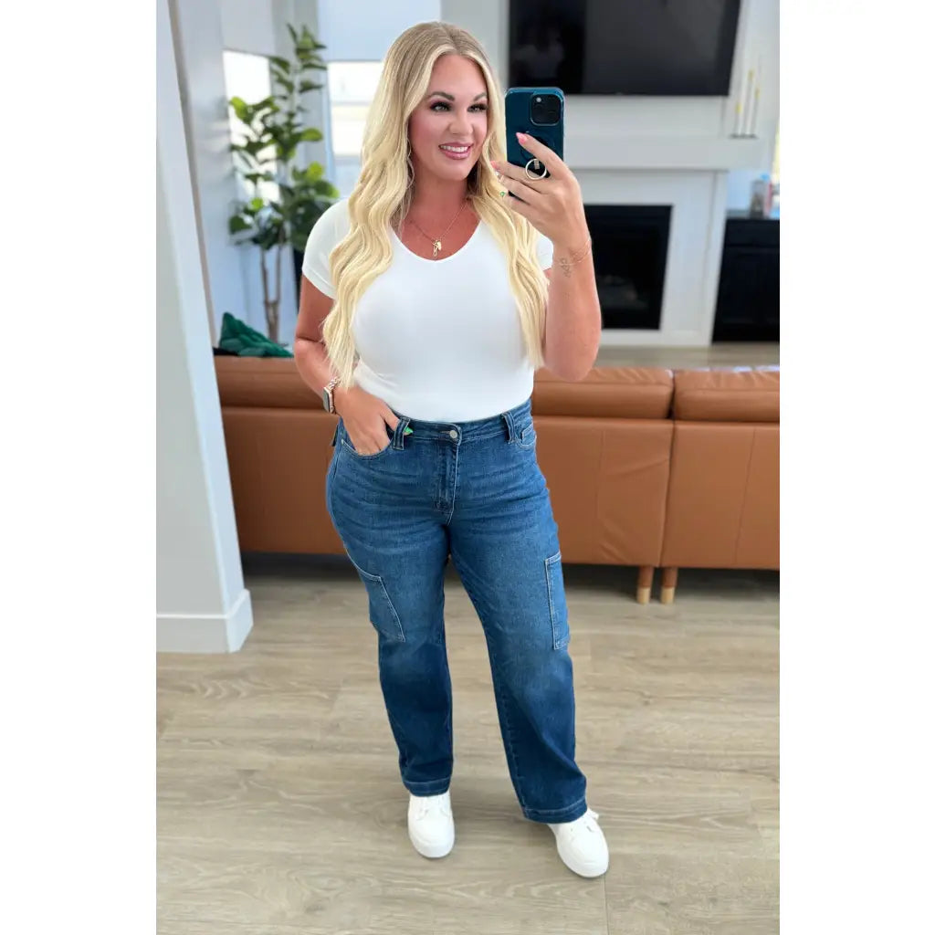Our Leila Cargo Judy Blue Jeans feature a trendy high rise fit versatile straight cut and cargo pockets. The 4-way