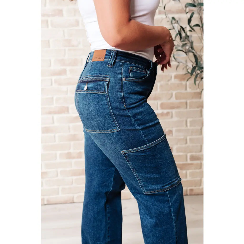 Our Leila Cargo Judy Blue Jeans feature a trendy high rise fit versatile straight cut and cargo pockets. The 4-way