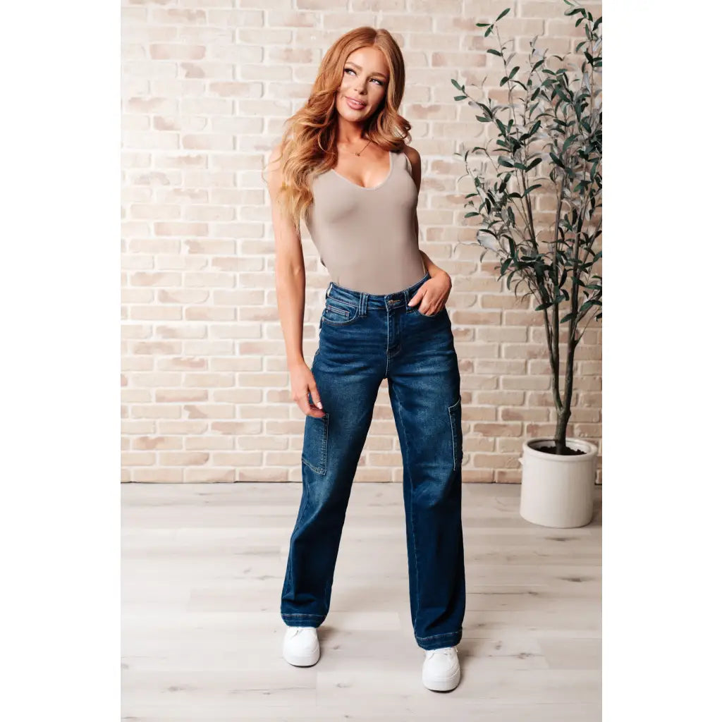 Our Leila Cargo Judy Blue Jeans feature a trendy high rise fit versatile straight cut and cargo pockets. The 4-way