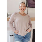 Stay effortlessly stylish with the Less Conversation V-Neck Top in beige. Featuring a textured knit and notched v-neck.