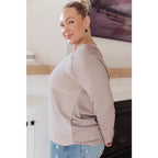 Stay effortlessly stylish with the Less Conversation V-Neck Top in beige. Featuring a textured knit and notched v-neck.