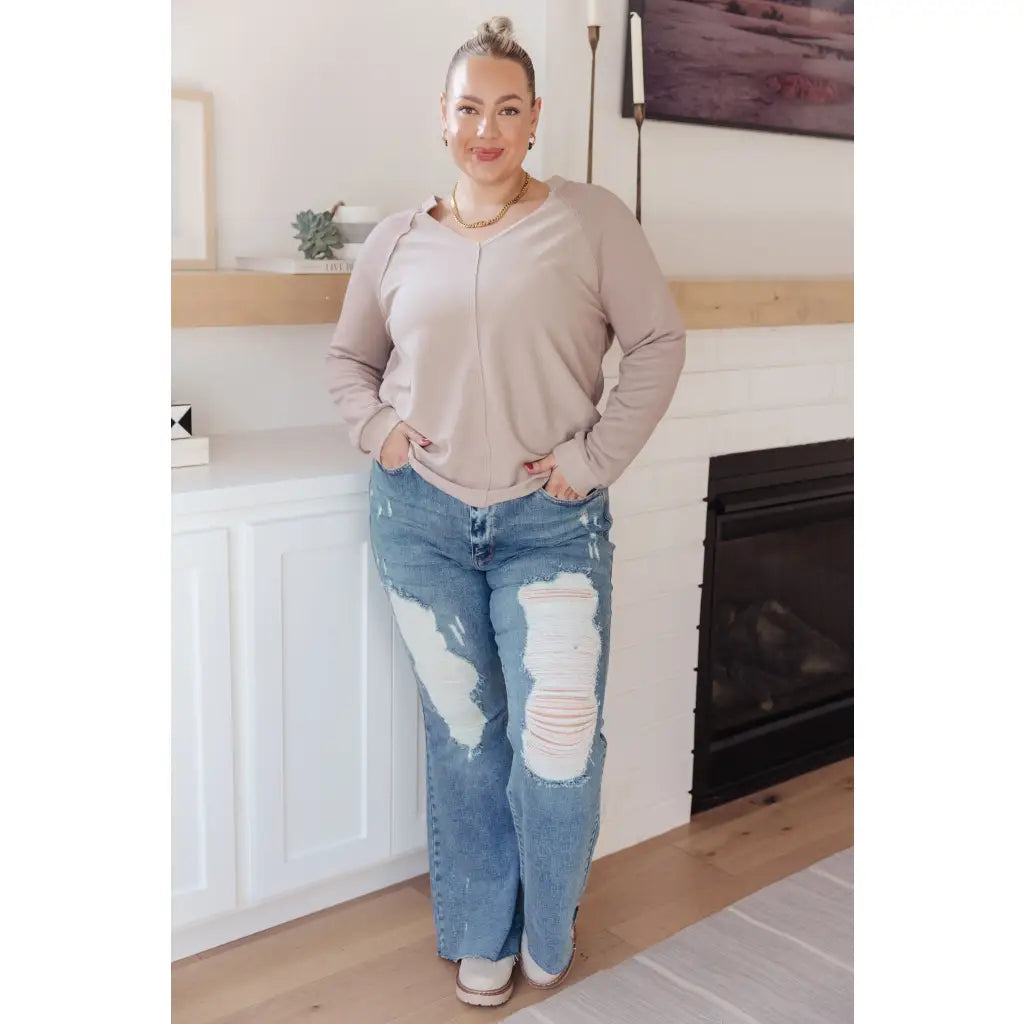 Stay effortlessly stylish with the Less Conversation V-Neck Top in beige. Featuring a textured knit and notched v-neck.