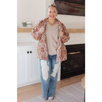 Stay effortlessly stylish with the Less Conversation V-Neck Top in beige. Featuring a textured knit and notched v-neck.