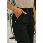 High waist black cargo jeans with wide leg plus sizes available. Non-distressed Judy Blue denim for street-chic style