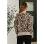 Cozy leopard print pullover in stretch knit. A bold soft sweater for plus size and standard fits. Perfect casual