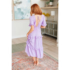 Lilac tiered midi dress with ruffle sleeves sweetheart neckline and open back. S to 3XL. Ships fast in 2–3 days.