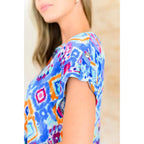 Our Lizzy Cap Sleeve Top in Blue and Magenta Ikat is crafted from light-weight cooling stretchy wrinkle-resistant