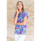 Our Lizzy Cap Sleeve Top in Blue and Magenta Ikat is crafted from light-weight cooling stretchy wrinkle-resistant