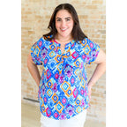 Our Lizzy Cap Sleeve Top in Blue and Magenta Ikat is crafted from light-weight cooling stretchy wrinkle-resistant