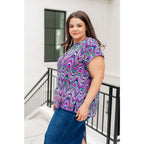 Revamp your wardrobe with our Lizzy Cap Sleeve Top in Purple Multi Marble. Crafted from wrinkle resistant light-weight