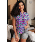 Revamp your wardrobe with our Lizzy Cap Sleeve Top in Purple Multi Marble. Crafted from wrinkle resistant light-weight