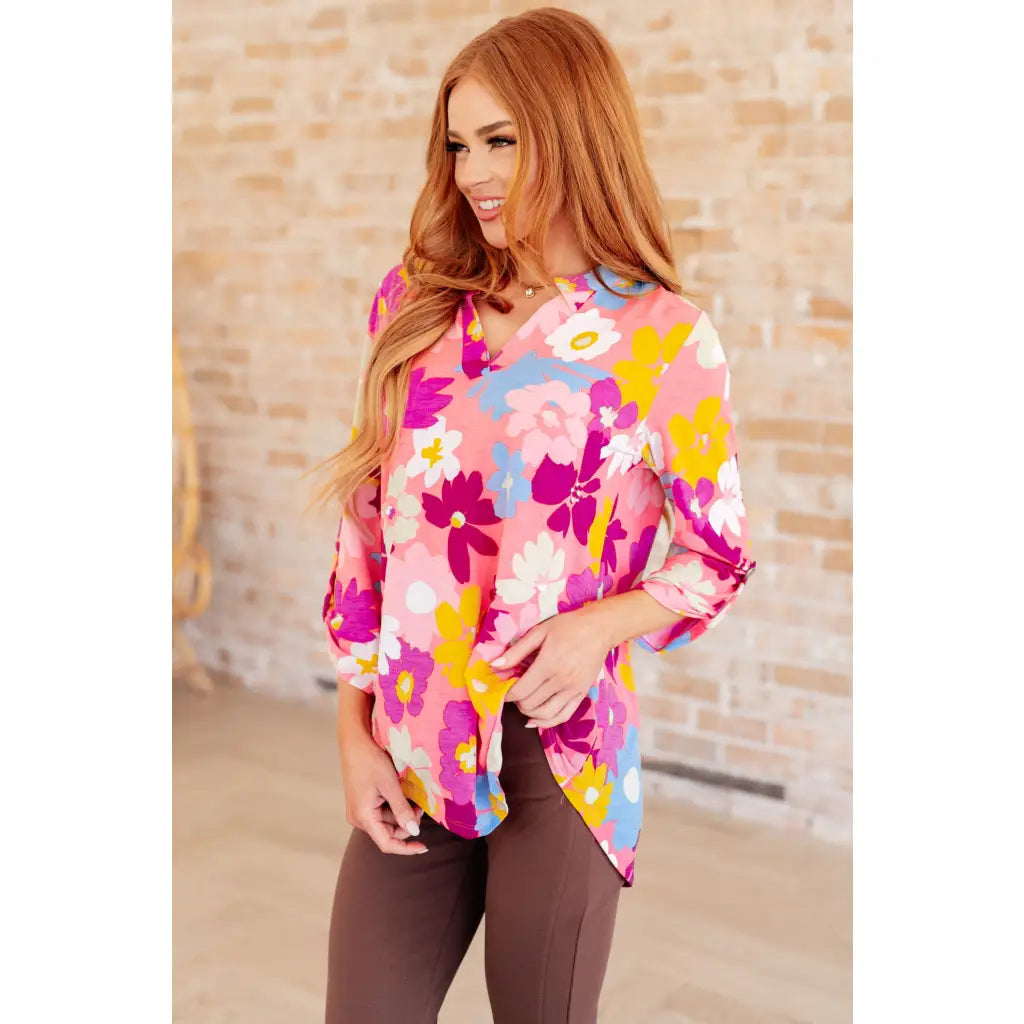 Transform your closet with our Lizzy Top in Coral and Magenta Painted Floral! Made from a stretchy bulgari