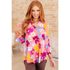 Transform your closet with our Lizzy Top in Coral and Magenta Painted Floral! Made from a stretchy bulgari