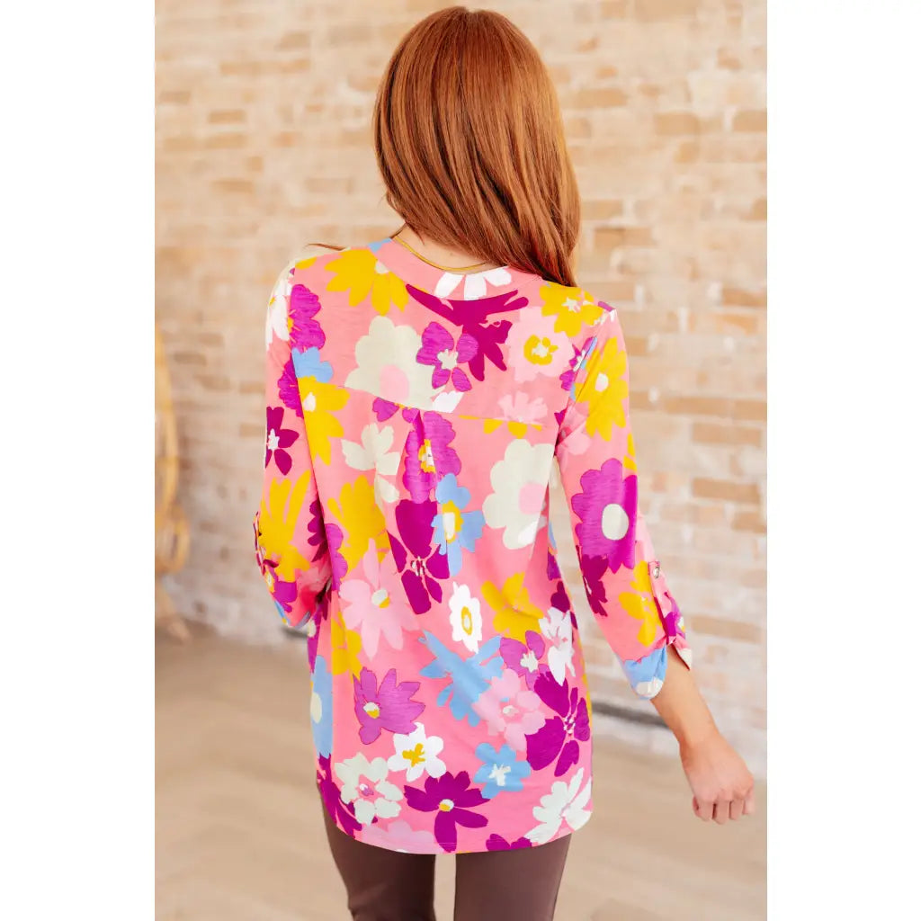 Transform your closet with our Lizzy Top in Coral and Magenta Painted Floral! Made from a stretchy bulgari