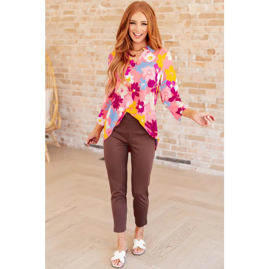 Transform your closet with our Lizzy Top in Coral and Magenta Painted Floral! Made from a stretchy bulgari