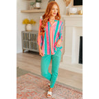 Transform your closet with our Lizzy Top in Ombre Mint Stripe. Made from wrinkle-free and stretchy Bulgari fabric