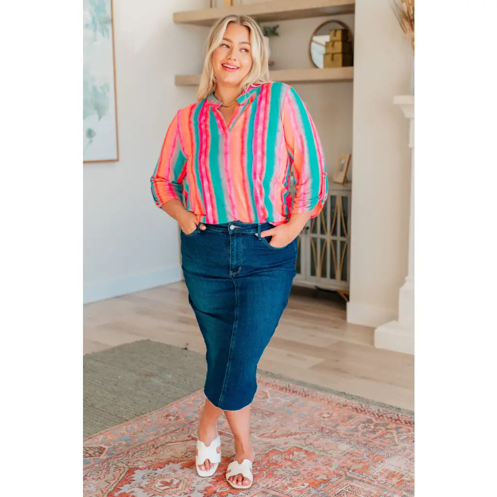 Transform your closet with our Lizzy Top in Ombre Mint Stripe. Made from wrinkle-free and stretchy Bulgari fabric