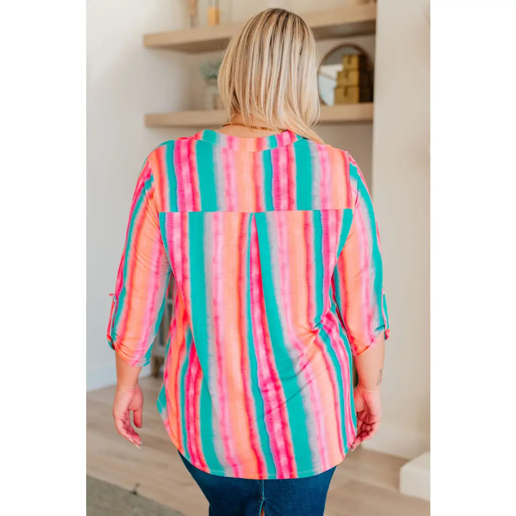 Transform your closet with our Lizzy Top in Ombre Mint Stripe. Made from wrinkle-free and stretchy Bulgari fabric