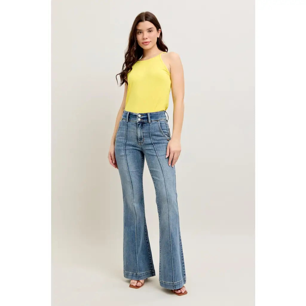 Long Legs and Lattes Flare Judy Blue jeans with high waist stretch fit seam detail. Plus size flattering boutique denim