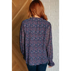 Add a touch of dreamy romance with our Lucid Dream Ruffle Neckline Blouse in Navy. Made crinkle woven fabric ditsy