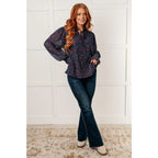 Add a touch of dreamy romance with our Lucid Dream Ruffle Neckline Blouse in Navy. Made crinkle woven fabric ditsy