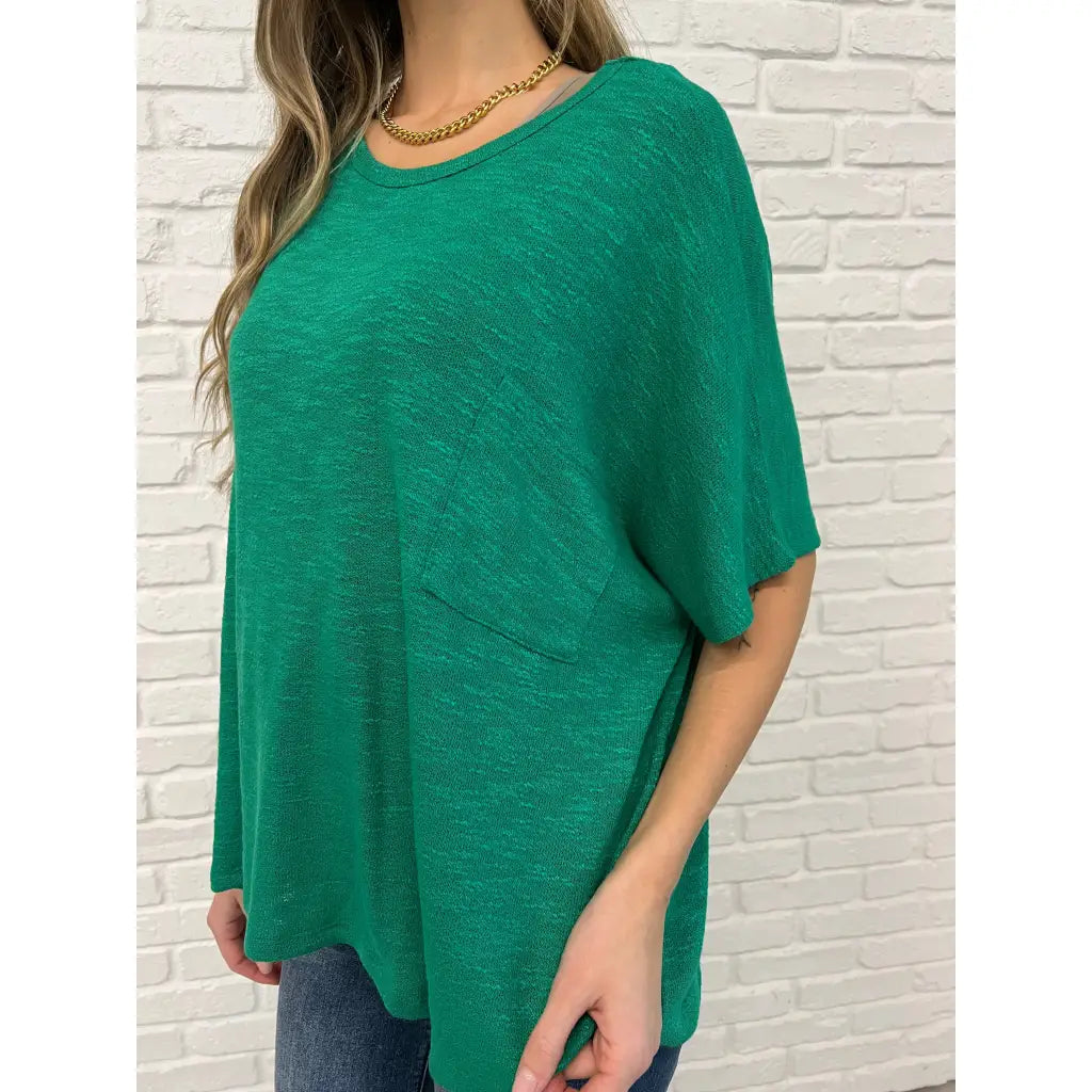 Flow effortlessly in the Lucky Breeze Dolman Sleeve Top Kelly Green! Oversized and ultra-comfy with dolman sleeves.