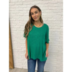Flow effortlessly in the Lucky Breeze Dolman Sleeve Top Kelly Green! Oversized and ultra-comfy with dolman sleeves.