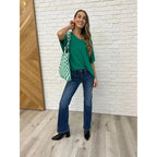 Flow effortlessly in the Lucky Breeze Dolman Sleeve Top Kelly Green! Oversized and ultra-comfy with dolman sleeves.