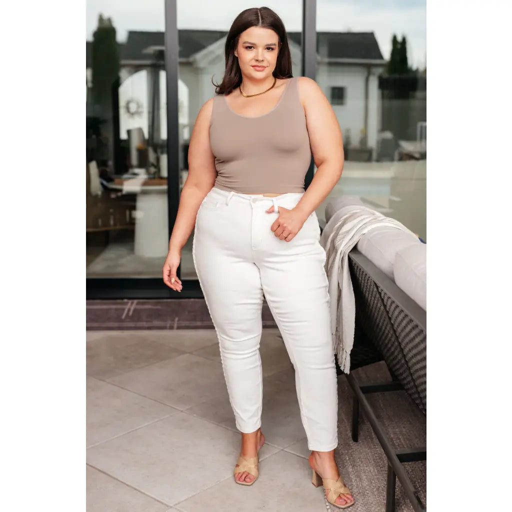 Shop Maddie Mid Rise Braided Side Seam Jeans from Judy Blue. Crisp white denim 4-way stretch braided detail relaxed