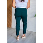 Our Magic Skinny Pants in Hunter Green are high rise ankle cropped pants featuring a slim fit and ponte knit