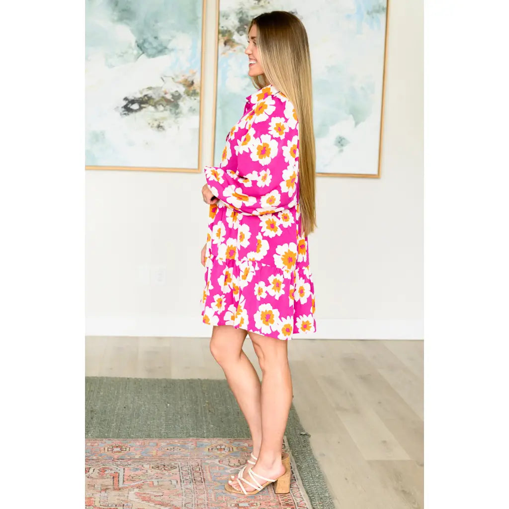 Introducing our Magnificently Mod Floral Shirt Dress! Featuring a vibrant floral print flattering collared neckline