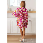 Introducing our Magnificently Mod Floral Shirt Dress! Featuring a vibrant floral print flattering collared neckline