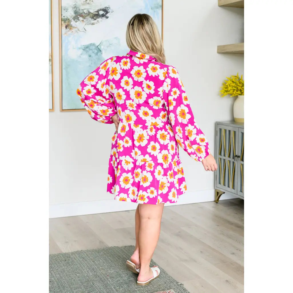 Introducing our Magnificently Mod Floral Shirt Dress! Featuring a vibrant floral print flattering collared neckline