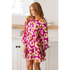 Introducing our Magnificently Mod Floral Shirt Dress! Featuring a vibrant floral print flattering collared neckline