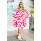 Introducing our Magnificently Mod Floral Shirt Dress! Featuring a vibrant floral print flattering collared neckline