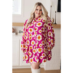 Introducing our Magnificently Mod Floral Shirt Dress! Featuring a vibrant floral print flattering collared neckline