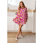 Introducing our Magnificently Mod Floral Shirt Dress! Featuring a vibrant floral print flattering collared neckline