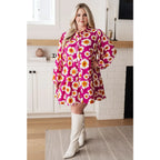 Introducing our Magnificently Mod Floral Shirt Dress! Featuring a vibrant floral print flattering collared neckline