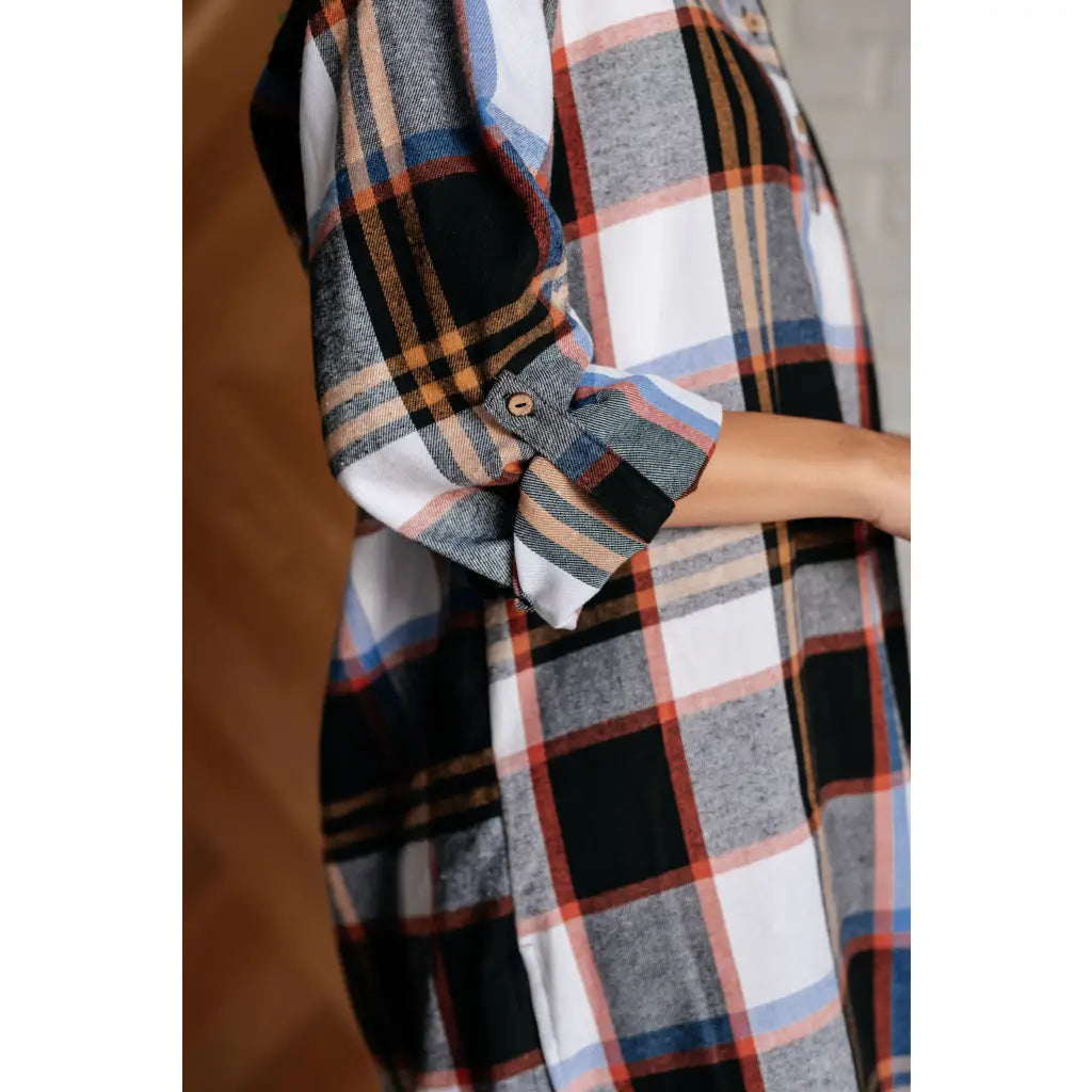 Our Make it Right Flannel Shirt Mini Dress is a fashion-forward look with its collared neckline side slits and long