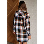 Our Make it Right Flannel Shirt Mini Dress is a fashion-forward look with its collared neckline side slits and long
