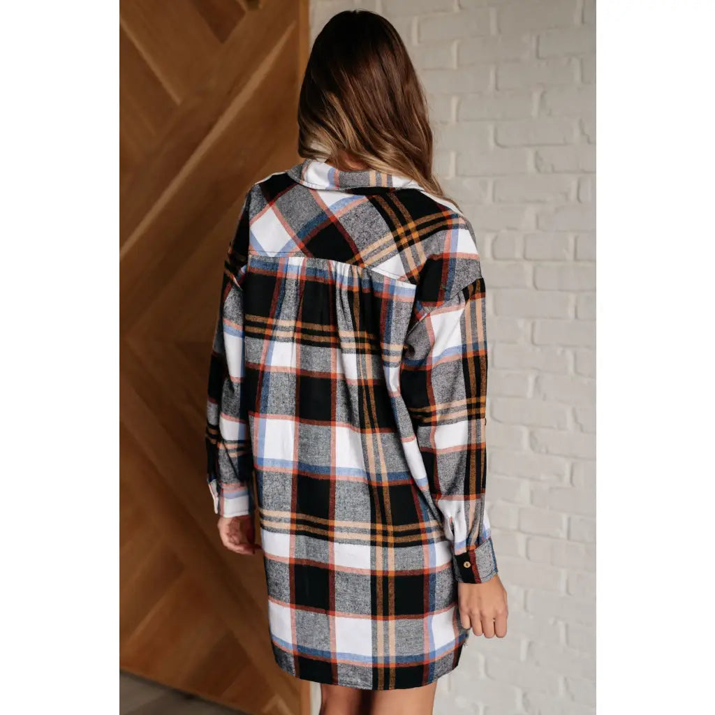 Our Make it Right Flannel Shirt Mini Dress is a fashion-forward look with its collared neckline side slits and long