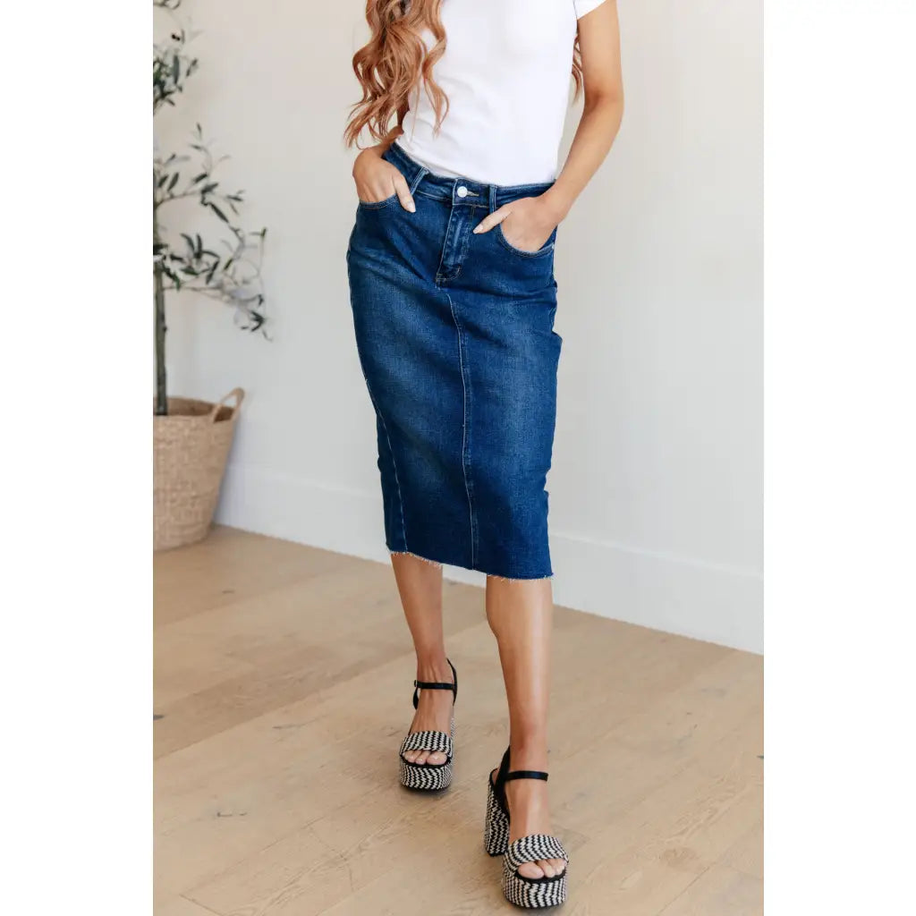 Get ready to rock your denim look with our Marcy High Rise Denim Midi Skirt from Judy Blue! With a flattering high rise