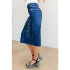 Get ready to rock your denim look with our Marcy High Rise Denim Midi Skirt from Judy Blue! With a flattering high rise