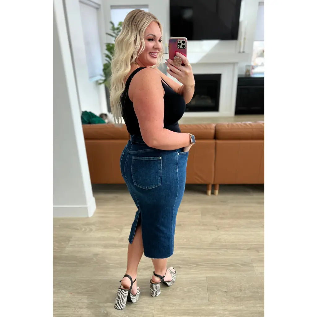 Get ready to rock your denim look with our Marcy High Rise Denim Midi Skirt from Judy Blue! With a flattering high rise
